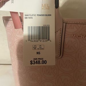 Pink Michael Kors bag never used just don’t have any uses for it or use it